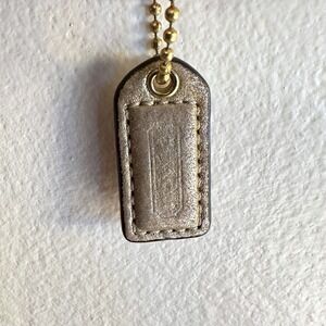 Coach 1" Mini Gold Leather Hangtag